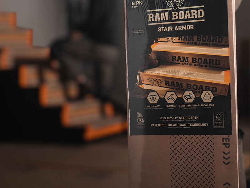 Package of ram board stair armor with stairs in the background.