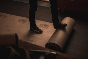 rolling out Ram Board on hardwood floor