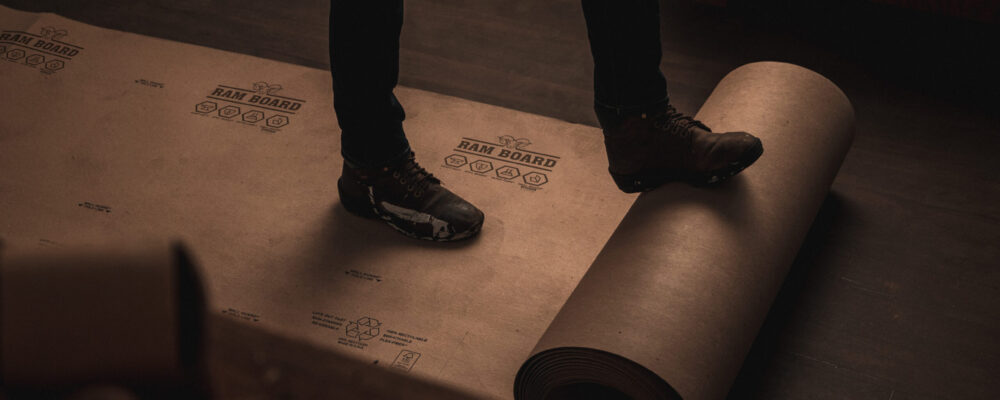 rolling out Ram Board on hardwood floor